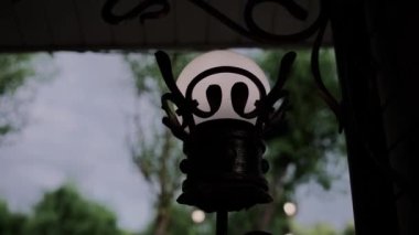 beautiful street lamp on the wall of the house