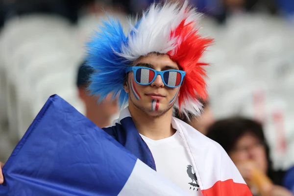 Supporters and fans during football match — Stock Photo, Image