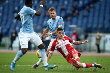 ROME, İtalya - 06.01.2021: Ciro Immobile (LAZIO), M.QuARTA (FIORENTINA) İtalyan Serie A Ligi 2020-2021 futbol karşılaşmasında SS LAZIO - FIORENTINA arasında Roma Olimpiyat Stadyumu 'nda oynanan karşılaşma