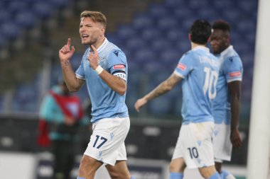 ROME, İtalya - 15.01.2021: Ciro Immobile (LAZIO) İtalya Serie A Ligi 2020-2021 futbol karşılaşması sırasında Roma Olimpiyat Stadyumu 'nda SS LAZIO - AS ROMA arasında oynanan maçta Ciro Immobile (LAZIO) CELEBRATES gol attı.