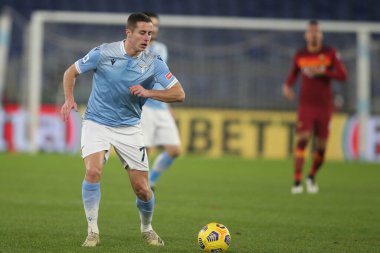 ROME, İtalya - 15.01.2021: Adam Marusiç (LAZIO) İtalyan Serie A Ligi 2020-2021 futbol karşılaşması sırasında Roma 'daki Olimpiyat stadyumunda SS LAZIO AS ROMA' ya karşı