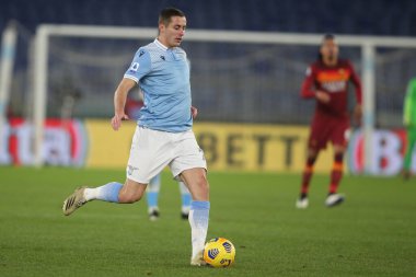 ROME, İtalya - 15.01.2021: Adam Marusiç (LAZIO) İtalyan Serie A Ligi 2020-2021 futbol karşılaşması sırasında Roma 'daki Olimpiyat stadyumunda SS LAZIO AS ROMA' ya karşı