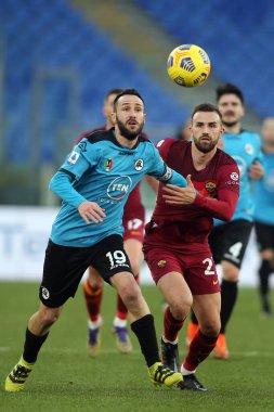 ROME, İtalya - 23.01.2021: TERZI, BORJA MAYORAL (ROMA) İtalyan Serisi 2020-2021 futbol karşılaşması sırasında Roma 'daki Olimpiyat stadyumunda AS ROMA - SPEZIA