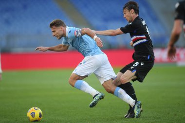 ROME, İtalya - 20.02.2021: Ciro Immobile (LAZIO), Verre (örnek) İtalyan Serisi A Ligi 2021 futbol karşılaşması sırasında SS LAZIO - S SMPDORIA, Roma Olimpiyat Stadyumu 'nda