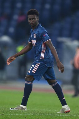 Roma, İtalya - 18 / 02 / 2021: Bukayo Saka (ARS), Roma 'daki Olimpiyat Stadyumu' nda BENFICA ile ARSENAL arasında oynanan 32 futbol karşılaşmasının UEFA EUROPE LeAGUE 20 / 21.