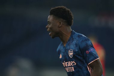 Roma, İtalya - 18 / 02 / 2021: Bukayo Saka (ARS), Roma 'daki Olimpiyat Stadyumu' nda oynanan BENFICA ile ARSENAL arasında oynanan 32 futbol karşılaşmasının UEFA Avrupa Liderliği 20 / 21 'inde golü attı.
