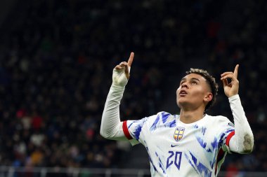 İtalya 'nın Milano kenti 16 Kasım 2025 tarihinde İtalya ile Norveç arasında oynanan maçta 2026 FIFA Dünya Kupası elemeleri için geçerli olan Birinci Grup Giuseppe Meazza - San Siro Stadyumu' nda oynanacak..