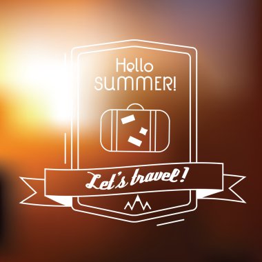 Arka plan bulanık üzerinde seyahat bavul amblemi