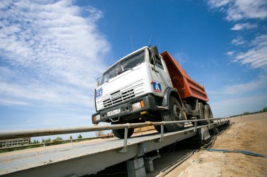 Omsk, Russia - June 2: truck drive on road construction