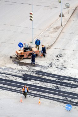 Road construction site, stones, gravel and asphalt