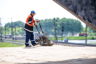 Omsk, Russia - June 2: road worker