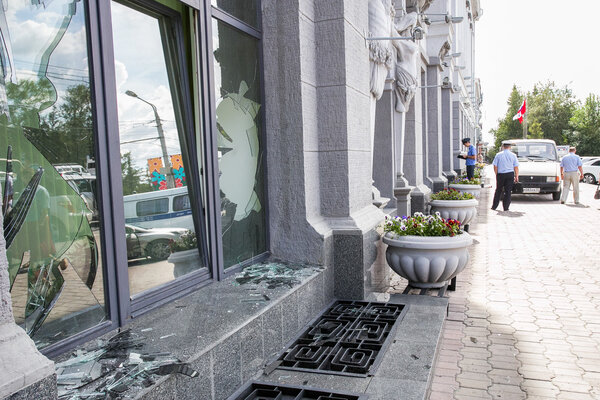 Russia, Omsk - August 4, 2015: Broken window of city hall