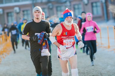 OMSK, RUSSIA - JANUARY 7, 2015: Christmas marathon in Omsk