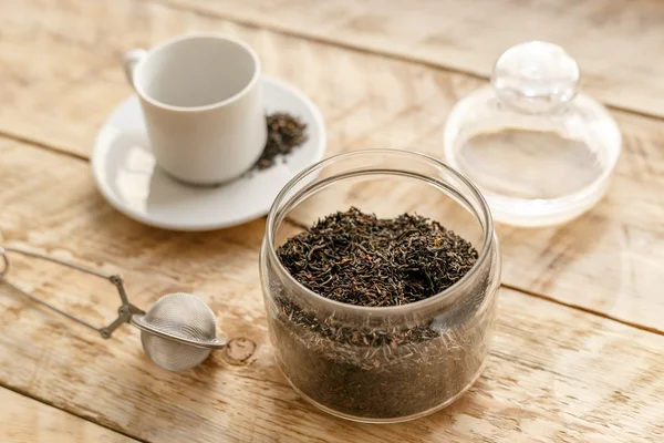 Tea set on the wooden table at sunny morning — Stock Photo, Image