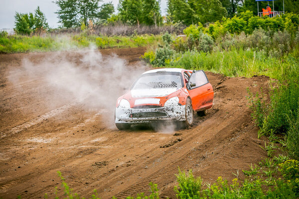 Omsk, Russia - June 22, 2014: Rally car in smoke