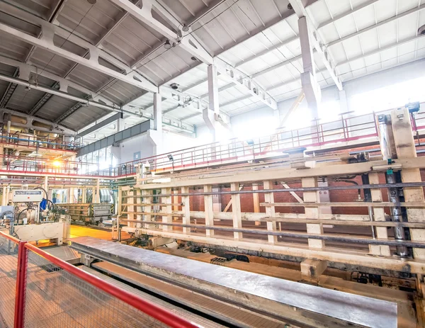 automated industrial equipment at the factory in  production hall