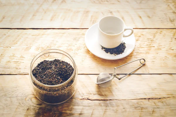 Tea set on the wooden table at sunny morning — Stock Photo, Image