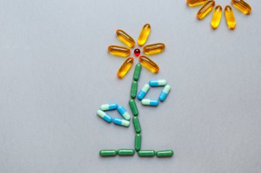 Gri arka plan üzerinde izole hapları