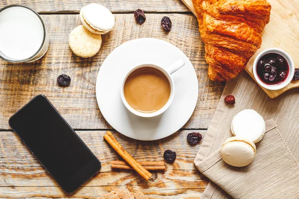 Breakfast at home on wooden table with cup of  coffee — Stock Photo, Image