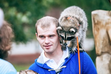 Omsk, Russia - September 7, 2014: Raccoons Day city festival clipart