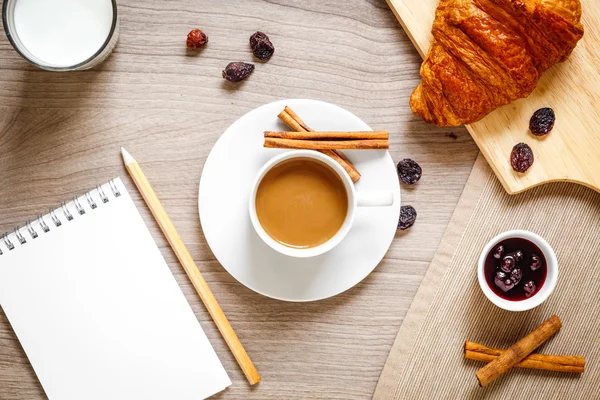 Breakfast at home on wooden table with cup of  coffee — Stock Photo, Image