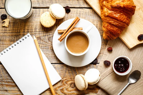 Breakfast at home on wooden table with cup of  coffee — Stock Photo, Image