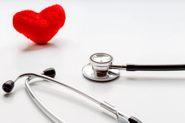 Concept of life stethoscope on white background with plush heart — Stock Photo, Image