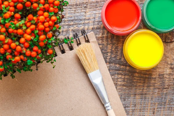 Hobby painting workplace with colored gouache jars top view — Stock Photo, Image
