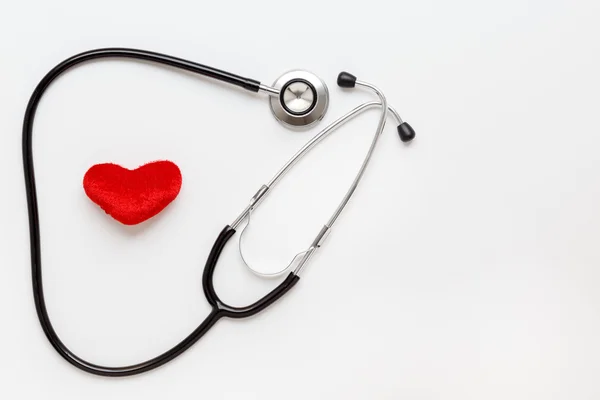 Concept of life stethoscope on white background with plush heart — Stock Photo, Image