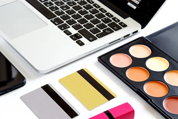 cosmetics discount card online shopping with laptop