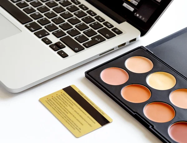 cosmetics discount card online shopping with laptop