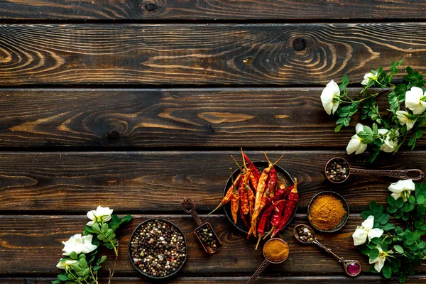 Various aromatic and hot spices with herba and flowers, view from above — Stock Photo, Image