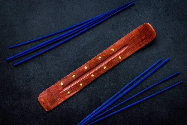 Air freshener sticks on dark blue background top view — Stock Photo, Image