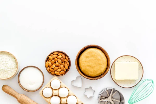 Bakery background with ingredients for dough top view