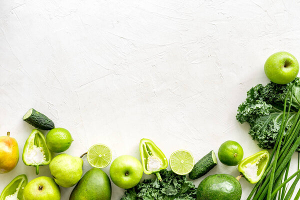 Flat lay of healthy vegetarian food - green vegetables top view