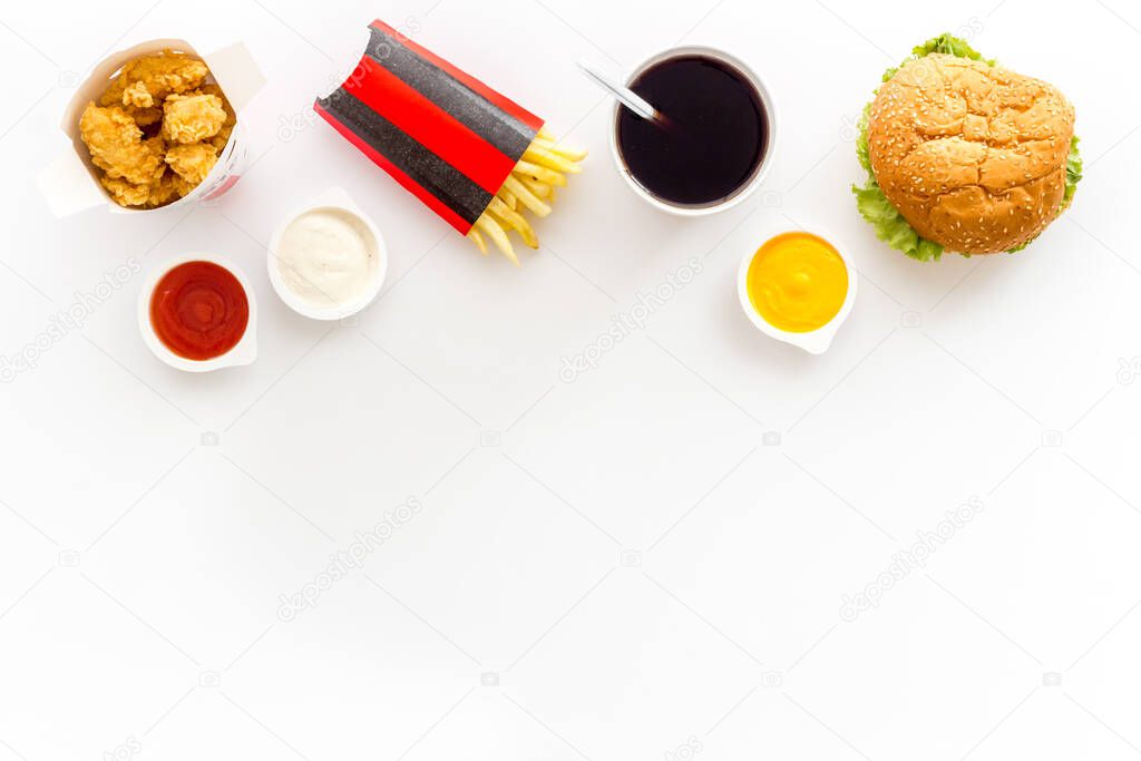 Set of fast food with hamburger and french fries. Top view.