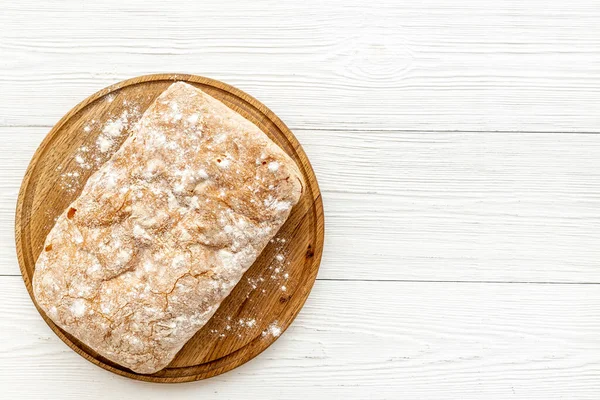 Pozadí pekařského jídla. Loaf of bread top view — Stock fotografie