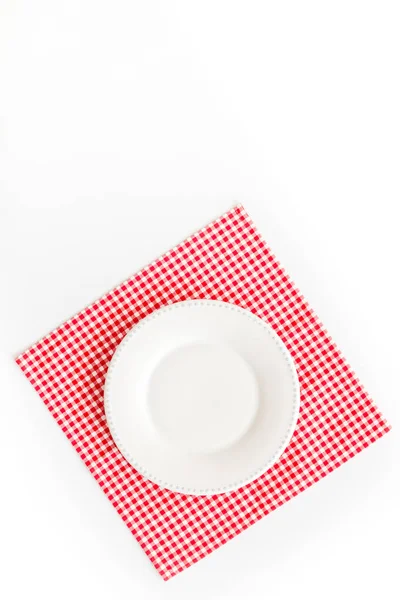 Table setting for dinner. Empty plate on napkin - dishware top view — Stock Photo, Image