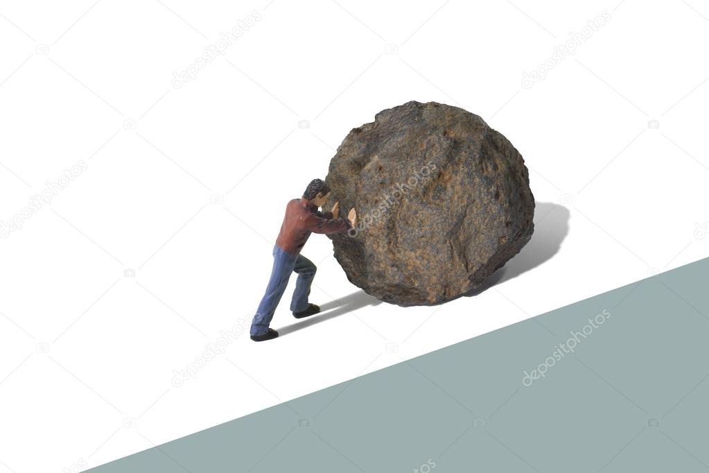 Toy Person Pushing a Large Boulder Uphill