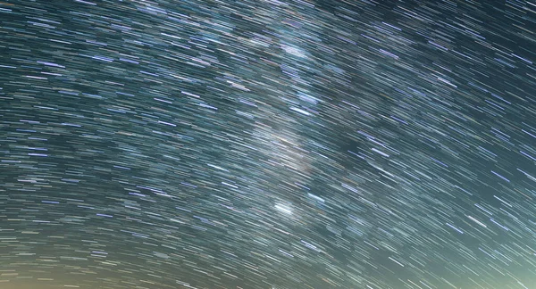 Star Trails and Milky Way Galaxy in South Sky Over Sierra Nevada Mountains California USA