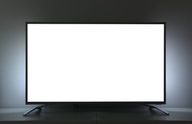 Sıcak bir oturma odasında metin ya da video için büyük beyaz ekranı kapat.