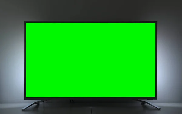 Close up of big green screen led TV in a cozy living room.