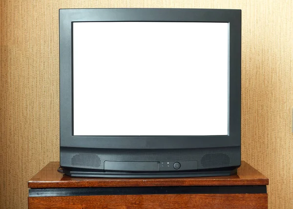Antika ahşap dolapta beyaz ekranlı antika televizyon, 80 'ler ve 90' ların tarzında klasik tasarım..