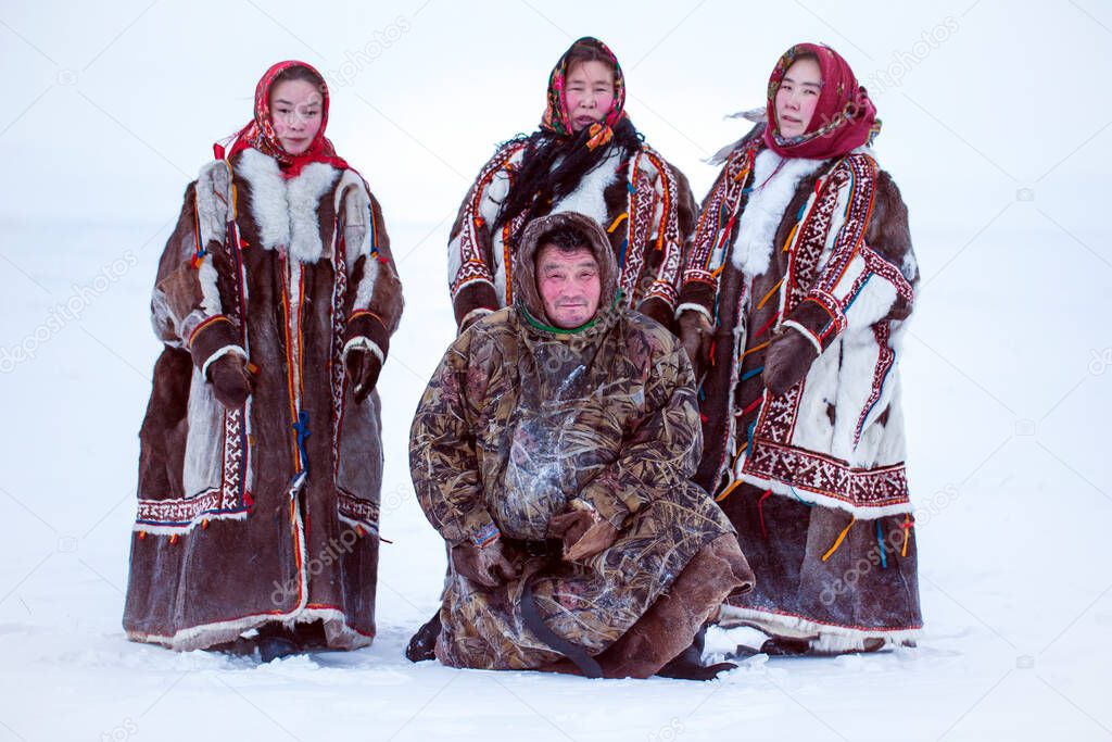 Yamalo-Nenets Autonomous Okrug, extreme north, Nenets family in the national winter clothes of the northern inhabitants of the tundra, the Arctic circle