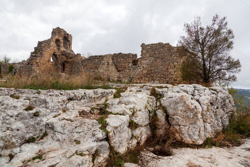 Ukraine. Bakhchisaray, Crimea. Residential caves inside ancient city Chufut Kale,These artificial 'buildings' used by ancients for living, food storage, destroyed castle walls