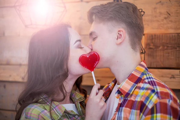 Young Loving Couple Kiss Each Other Cover Lips Candy Form — Stock Photo, Image