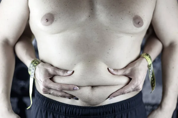 Избыточный Вес Ожирение Толстая Талия Толстяк Проверяет Талию Женскими Руками — стоковое фото