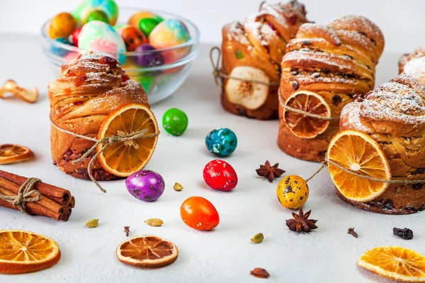 Easter cake Kraffin (Cruffin), with nuts and candied fruit sprinkled with powdered sugar, 2021 trend of the easter cake.