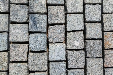 Kaldırım taşı arka planı, yol için gri renkli beton bloklar
