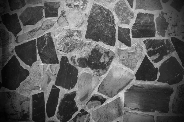 石の壁の黒と白のテクスチャ. — ストック写真